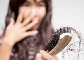 This Daily Routine May Stop Summertime Hair Loss, According to Research