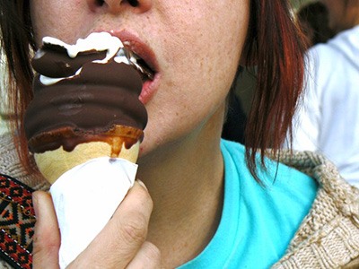 Yes, eating a lot of sugar can affect your skin. Here's how.
