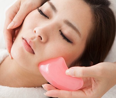 How a Gua Sha Facial Massage Could Benefit Your Skin, According to Dermatologists